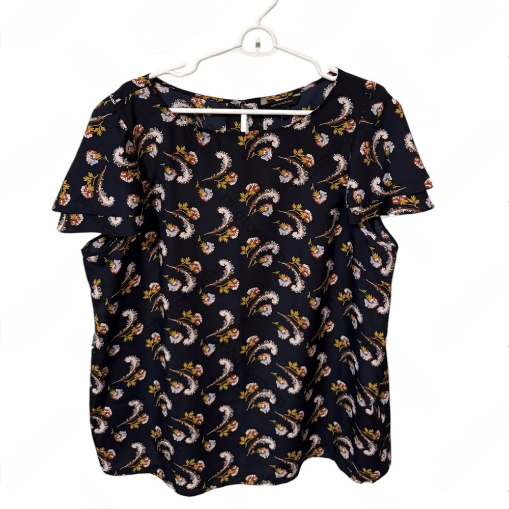 Banana Republic navy blue blouse with florals, button on back and layered sleeve